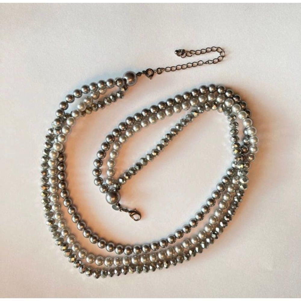 The Roman Company tri strand grey beaded necklace